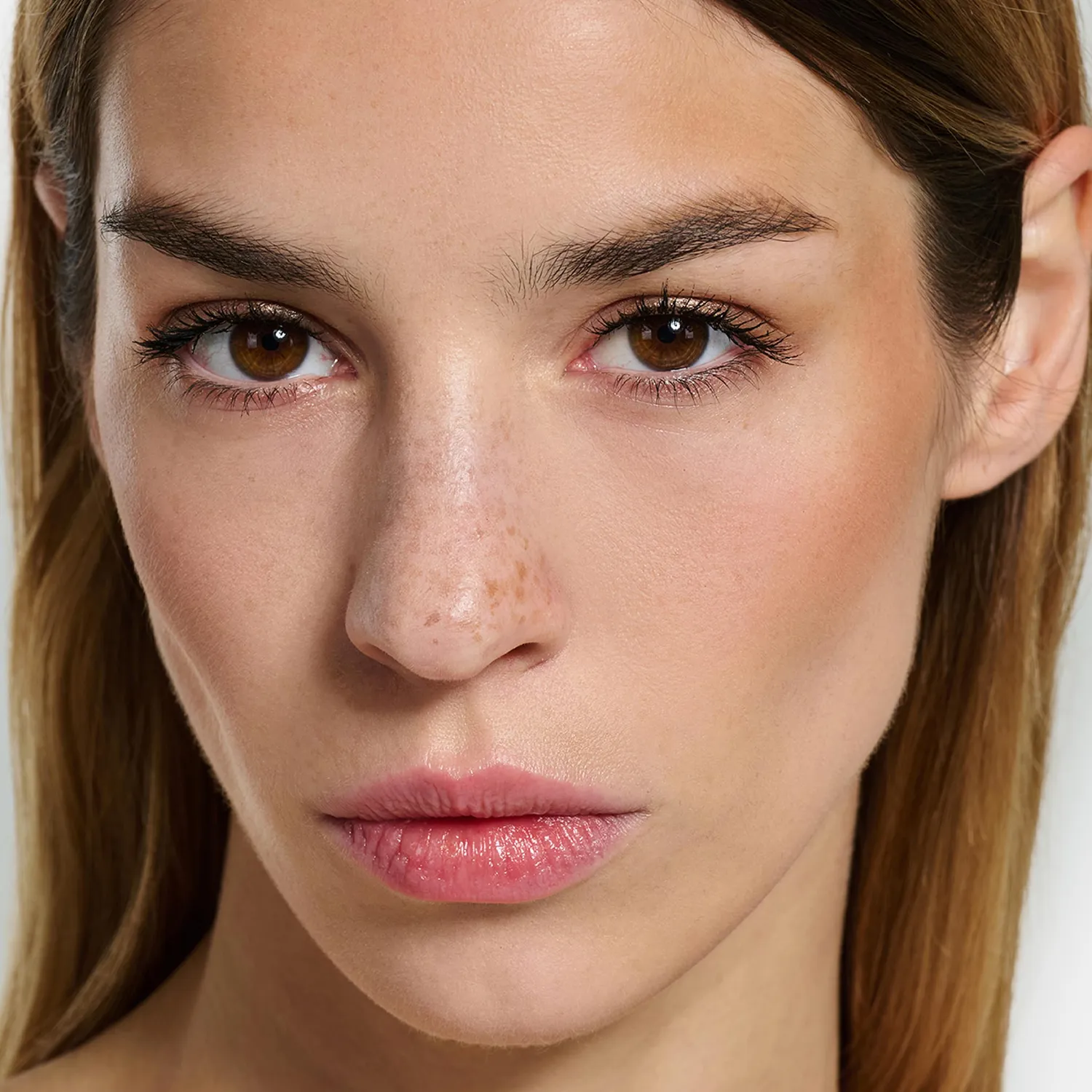 Infinity Sunlit Terra Compatta viso effetto bronze opaco