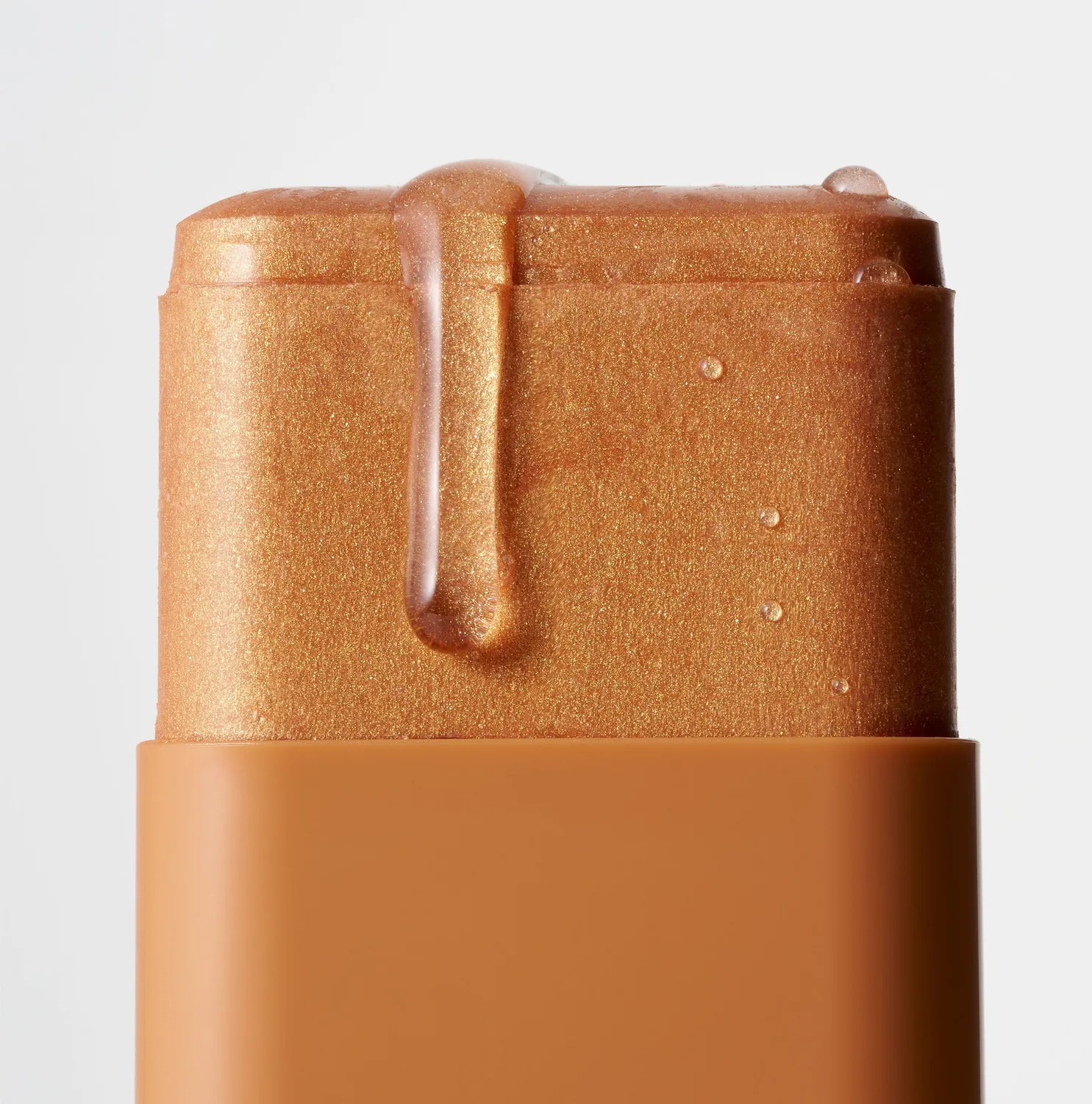 Iconic London Glow All Over Melting Balm Stick illuminante viso corpo